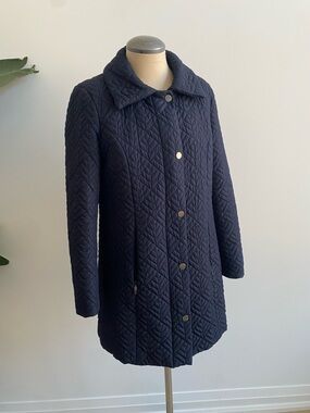 Quilted Navy Puffer Coat with Snap Closure